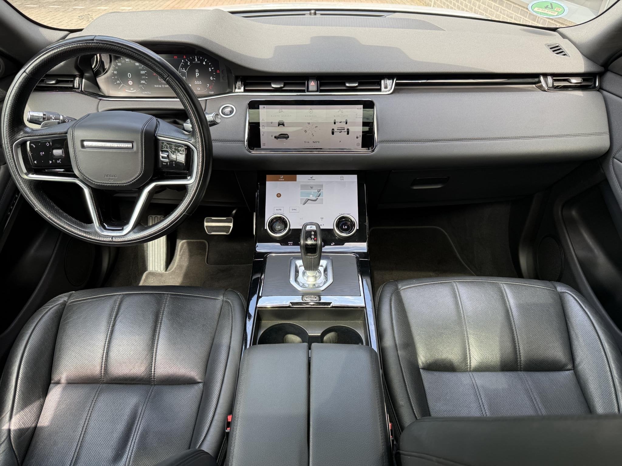 Land Rover Range Rover Evoque 1.5 P300e AWD HSE / Schuif Kan, Auto's, Land Rover, Automaat, 309 pk, Stof, Automatische klimaatregeling