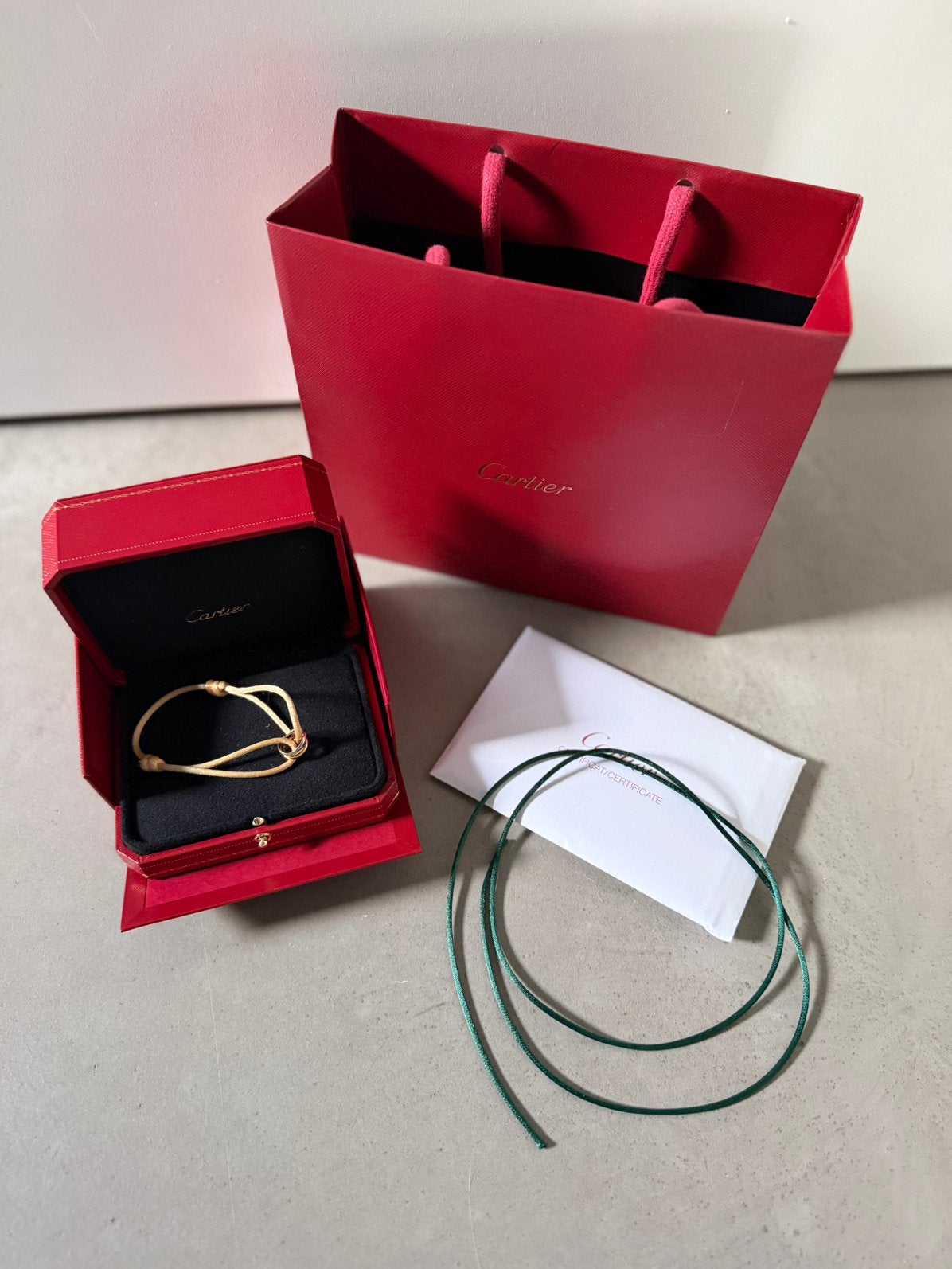 Cartier trinity armband, Sieraden, Tassen en Uiterlijk, Ophalen, Zo goed als nieuw, Overige kleuren, Overige materialen