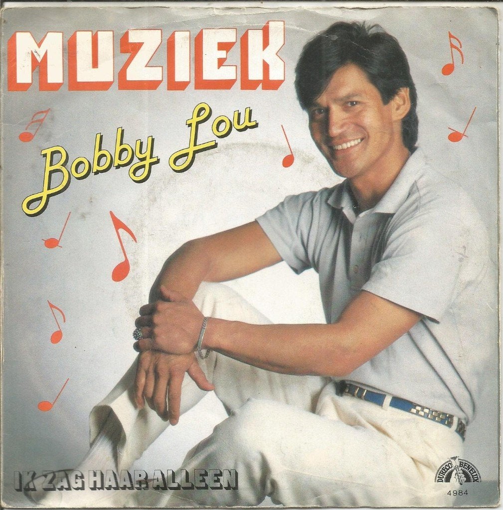 Bobby Lou : Muziek (1985), Gebruikt, Fotohoes, 7 inch, Ophalen of Verzenden