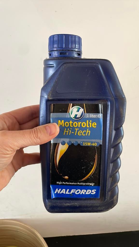 Aangebroken fles motorolie halfords 15W-40, Ophalen