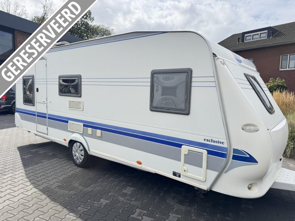 Hobby 560 KMFE / 6 persoons / topstaat / voortent, Dwars-stapelbed, Rondzit, Hobby, Bedrijf