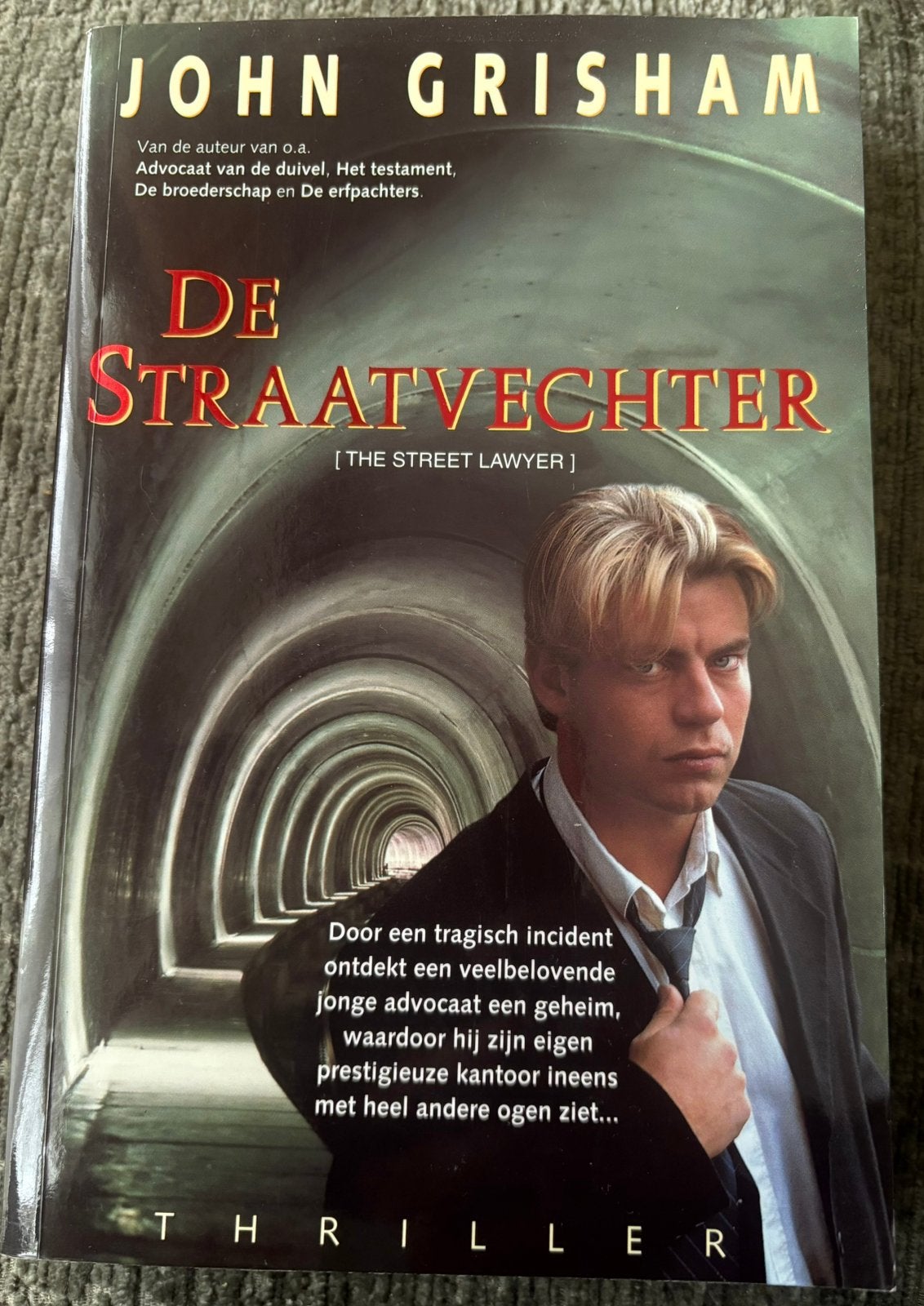 John Grisham - De straatvechter, Ophalen of Verzenden, Nieuw, John Grisham