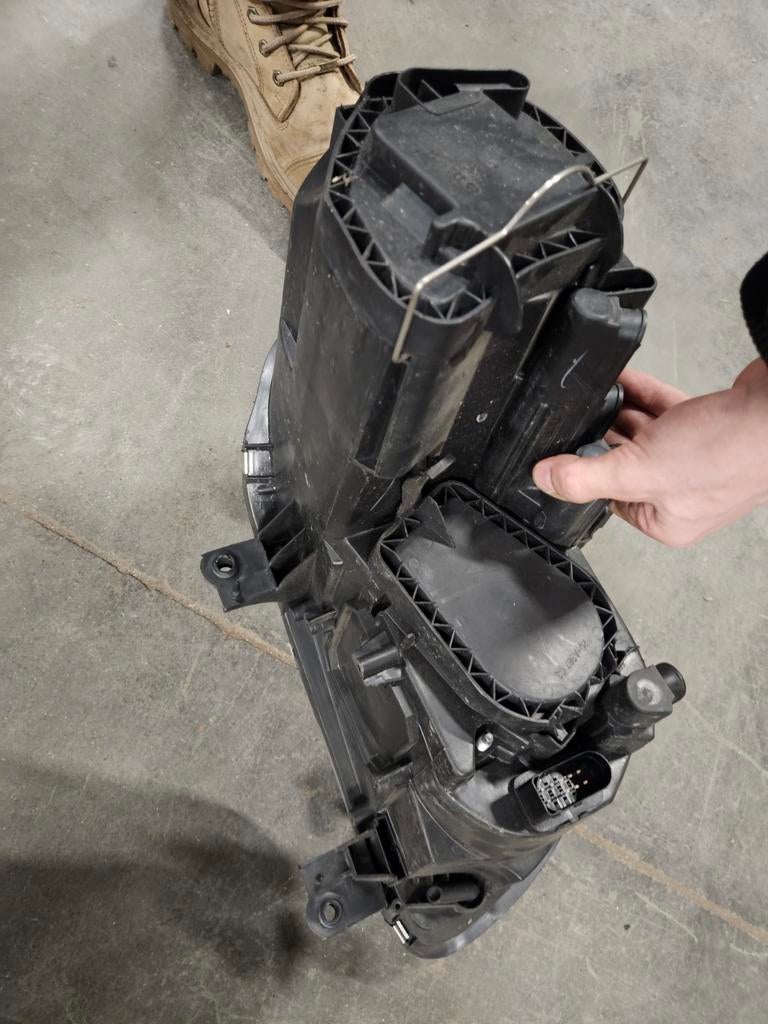 Koplampen Caddy, Ophalen