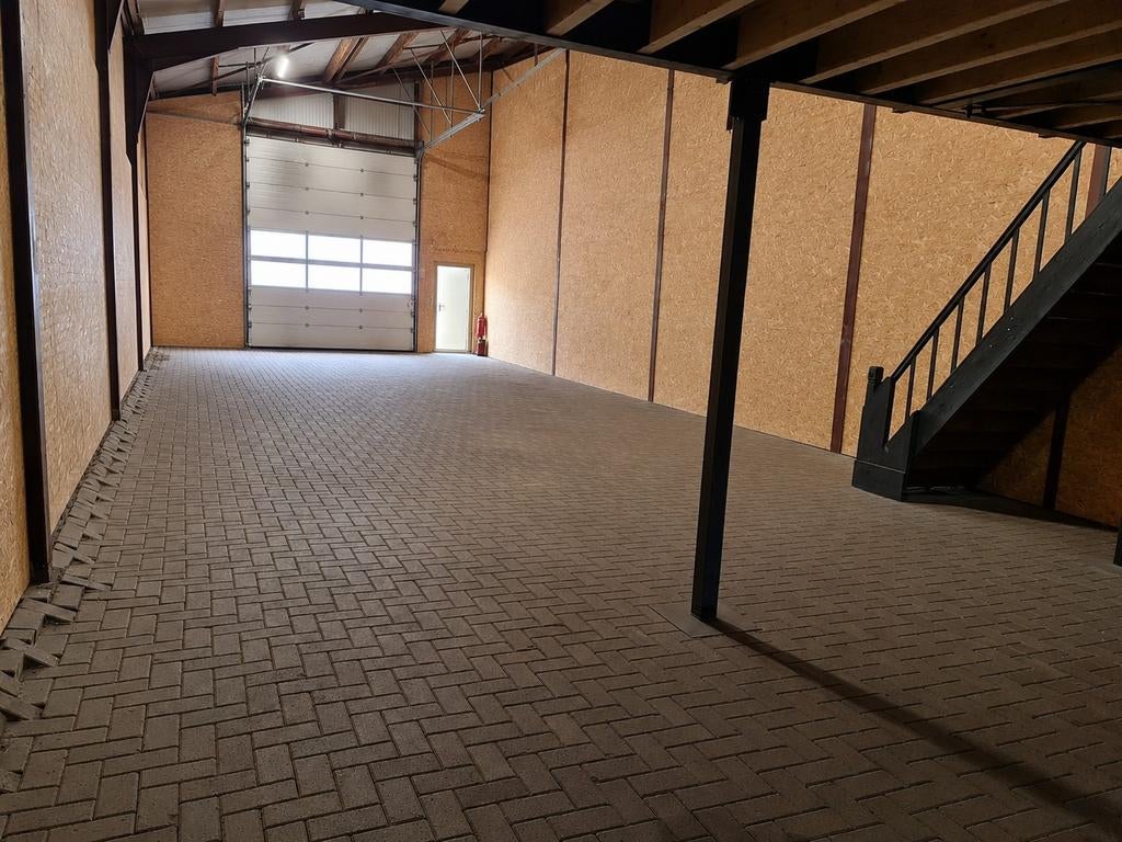 Te Huur Bedrijfsruimte 141m2 bgg en 26m2 verdieping, Ophalen, Zo goed als nieuw