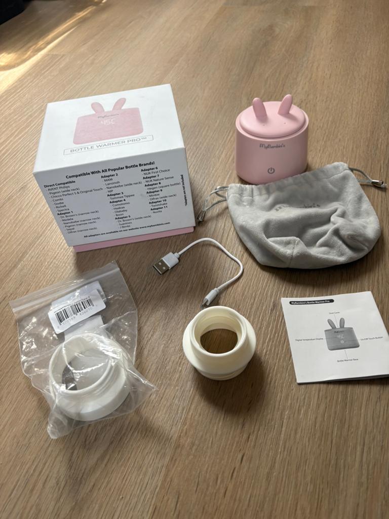 Mybambini's Oplaadbare Flessenwarmer Pro - Roze, Kinderen en Baby's, Babyvoeding en Toebehoren, Ophalen of Verzenden, Zo goed als nieuw