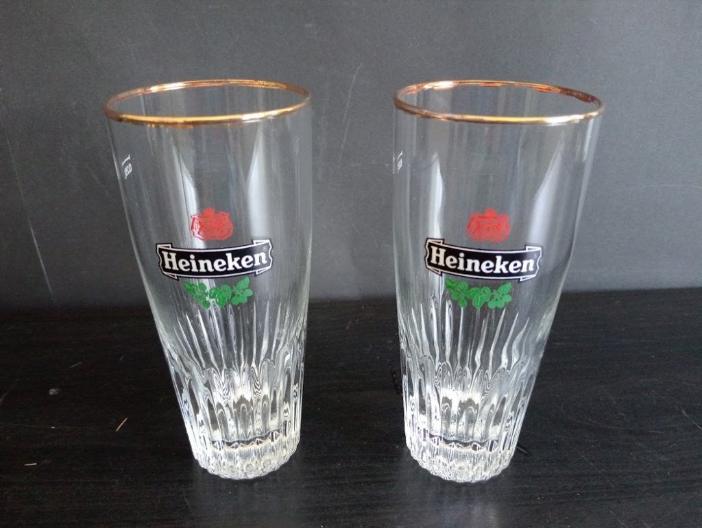 Vintage Heineken bierglazen voorzien van goudkleurige rand., Verzamelen, Biermerken, Ophalen of Verzenden, Nieuw, Glas of Glazen