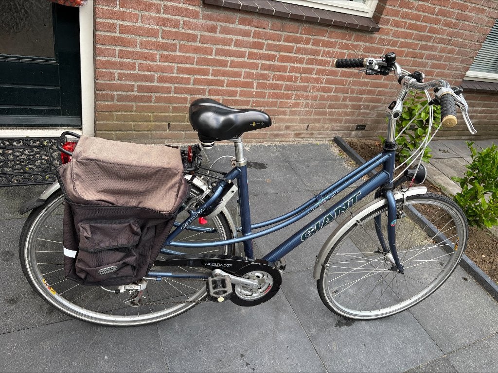 Te koop: Giant Tourer Light met bagagedrager en fietstas, Ophalen, Gebruikt, Velgrem, Versnellingen
