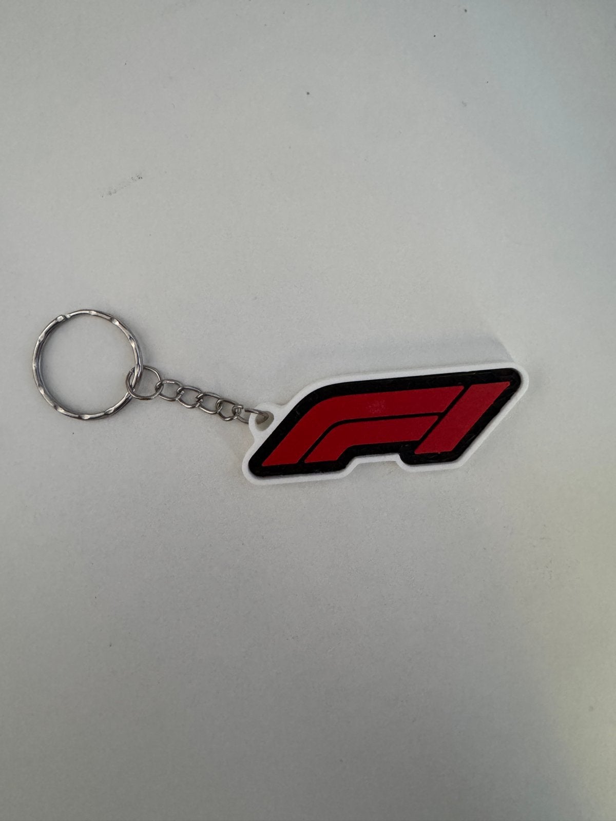 Formule 1 sleutelhanger - F1 logo, Verzamelen, Ophalen of Verzenden, Nieuw, Sport