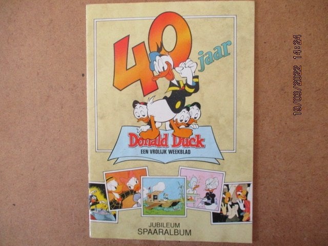 adv6094 donald duck 40 jaar spaaralbum, Eén stripboek, Ophalen, Gelezen