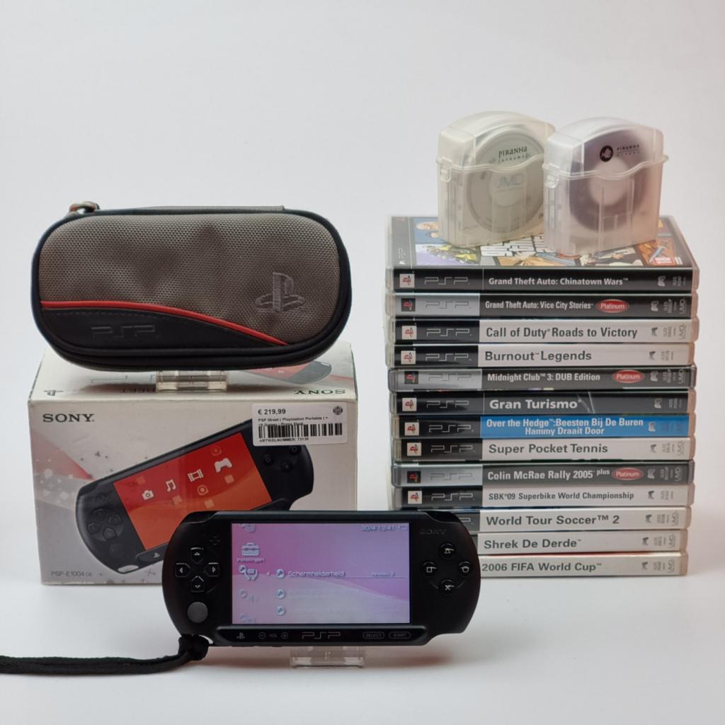 PSP Street E1004 ( Playstation Portable ) + 19 Games, Sony, Zo goed als nieuw, Support@sony.com, 1-7-1 Konan, Minato-ku
Tokyo 108-0075
Japan