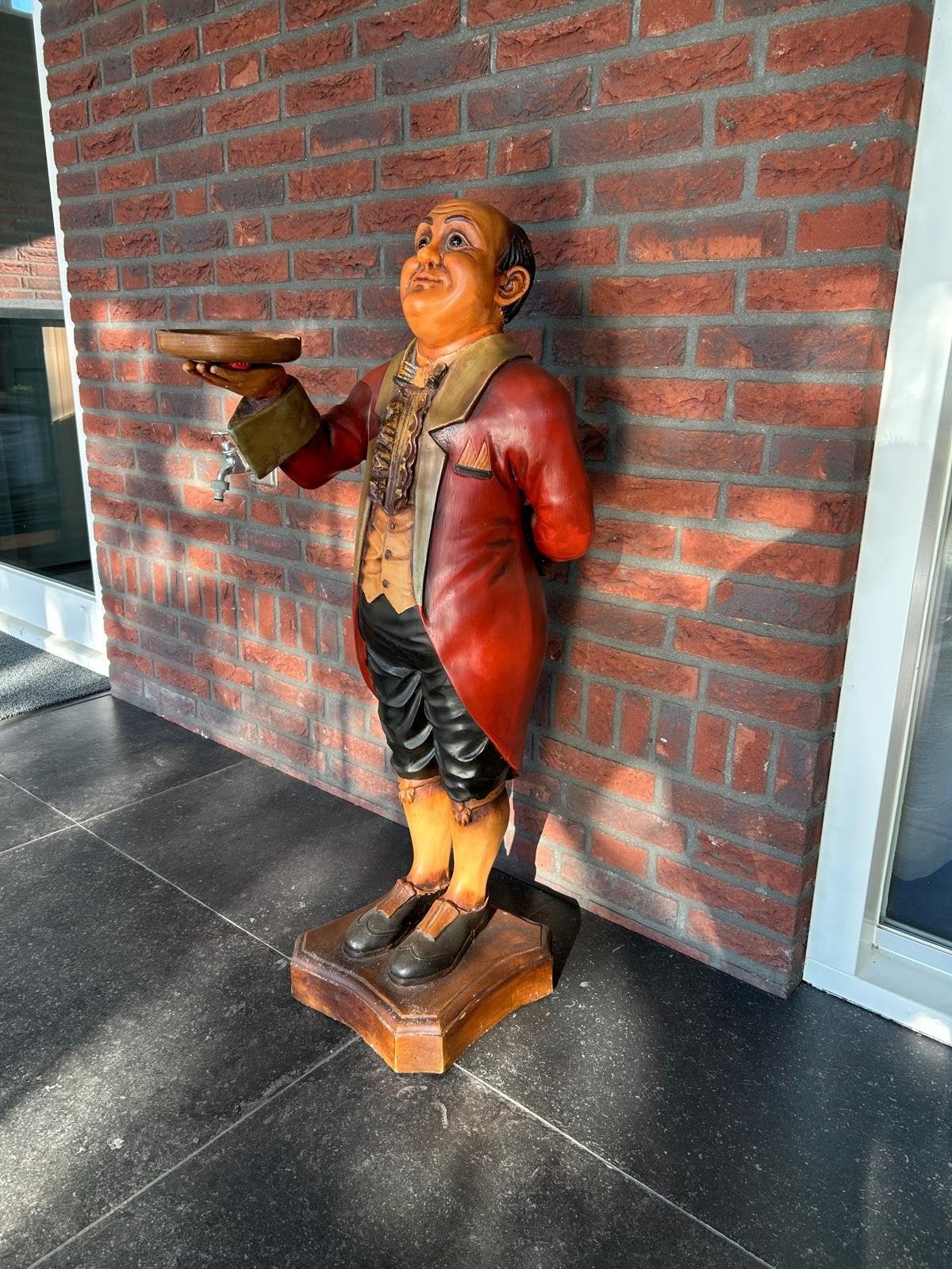 Butler beeld, Ophalen