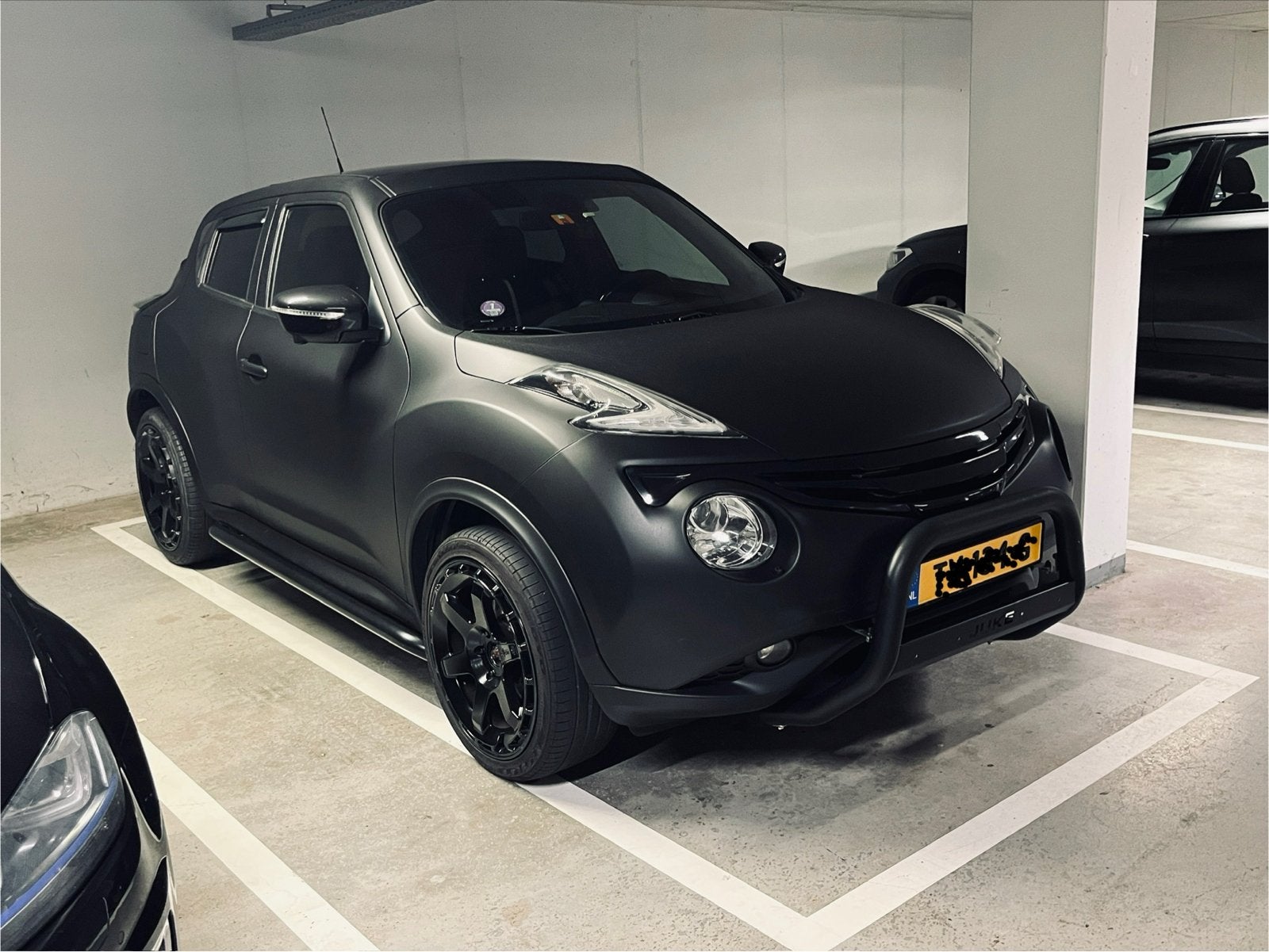 Nissan Juke 1.6 CVT 86KW 2015 Zwart, Auto's, USB, Zwart, 4 cilinders, Leder