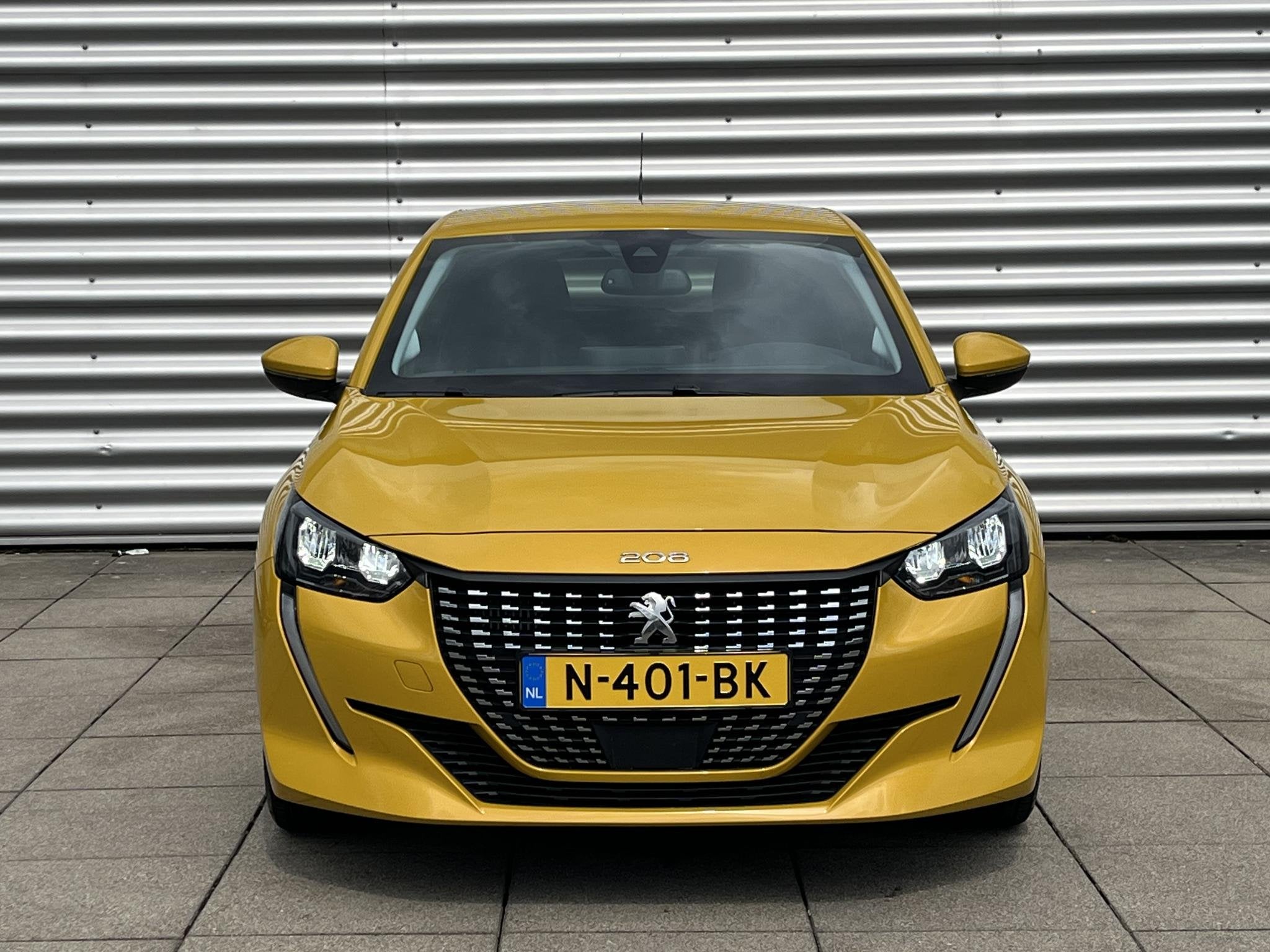 Peugeot 208 1.2 PureTech 100 Allure | Handgeschakeld | Cruis, Auto's, Voorwielaandrijving, 101 pk, Gebruikt, Leder en Stof