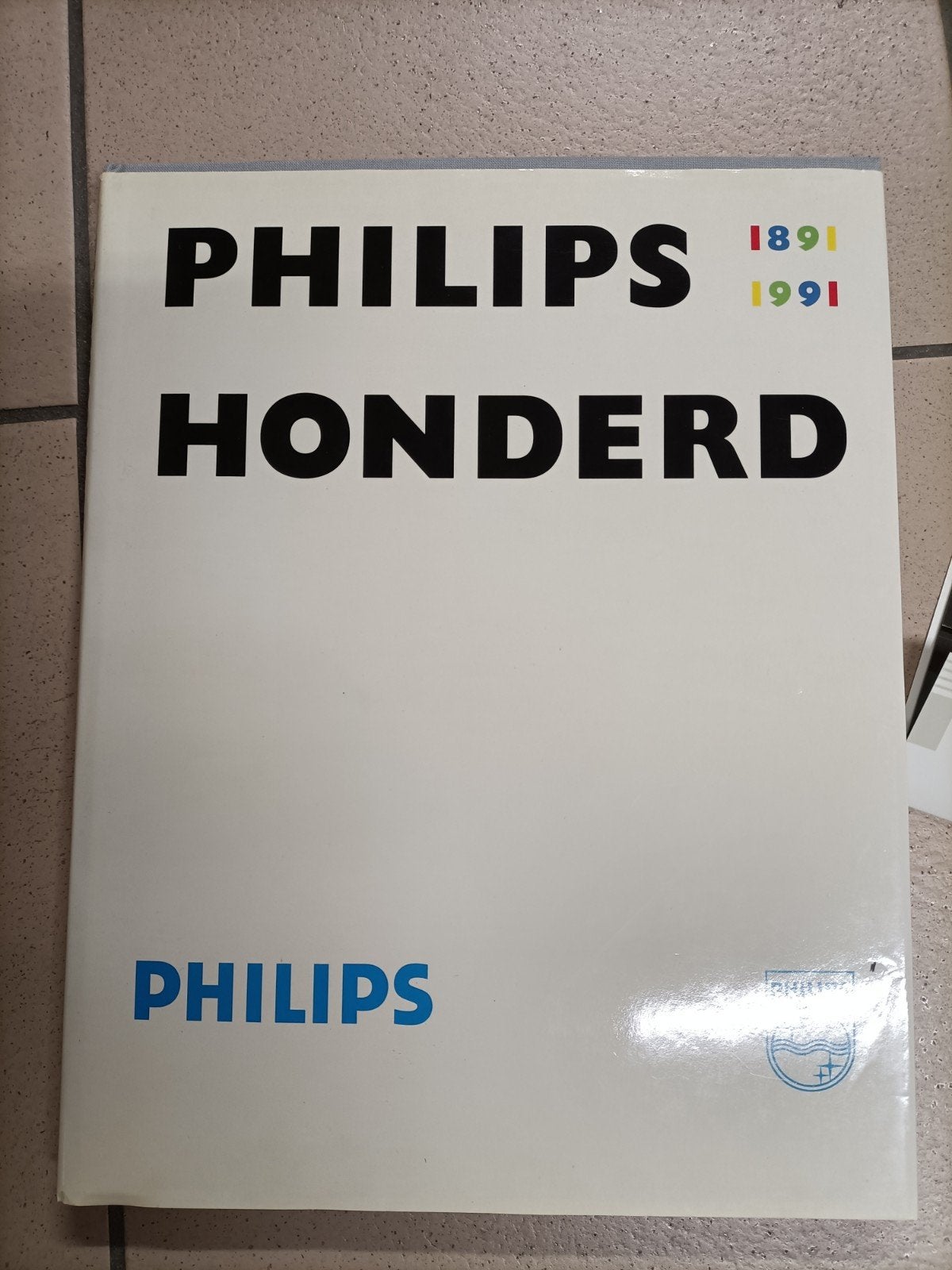Boek Philips Honderd, Zo goed als nieuw, Philips, Ophalen, 20e eeuw of later