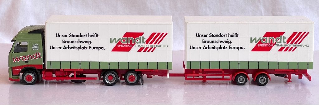 Herpa 149372:  Volvo FH Globetrotter "Spedition Wandt", Hobby en Vrije tijd, Modelauto's | 1:87, Ophalen of Verzenden, Zo goed als nieuw