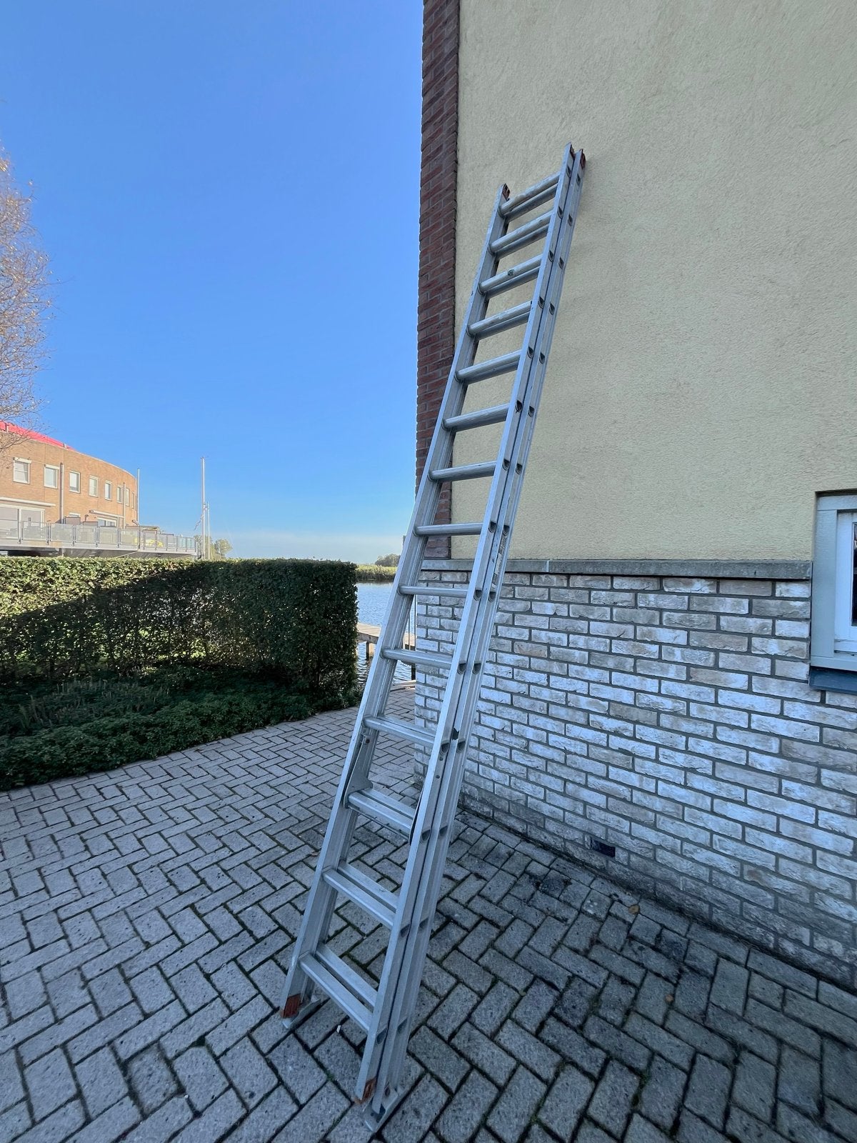 2-delige ladder ,14 treden per deel, 3,80 meter lang, Gebruikt, Trap, Ophalen of Verzenden, Opvouwbaar of Inschuifbaar