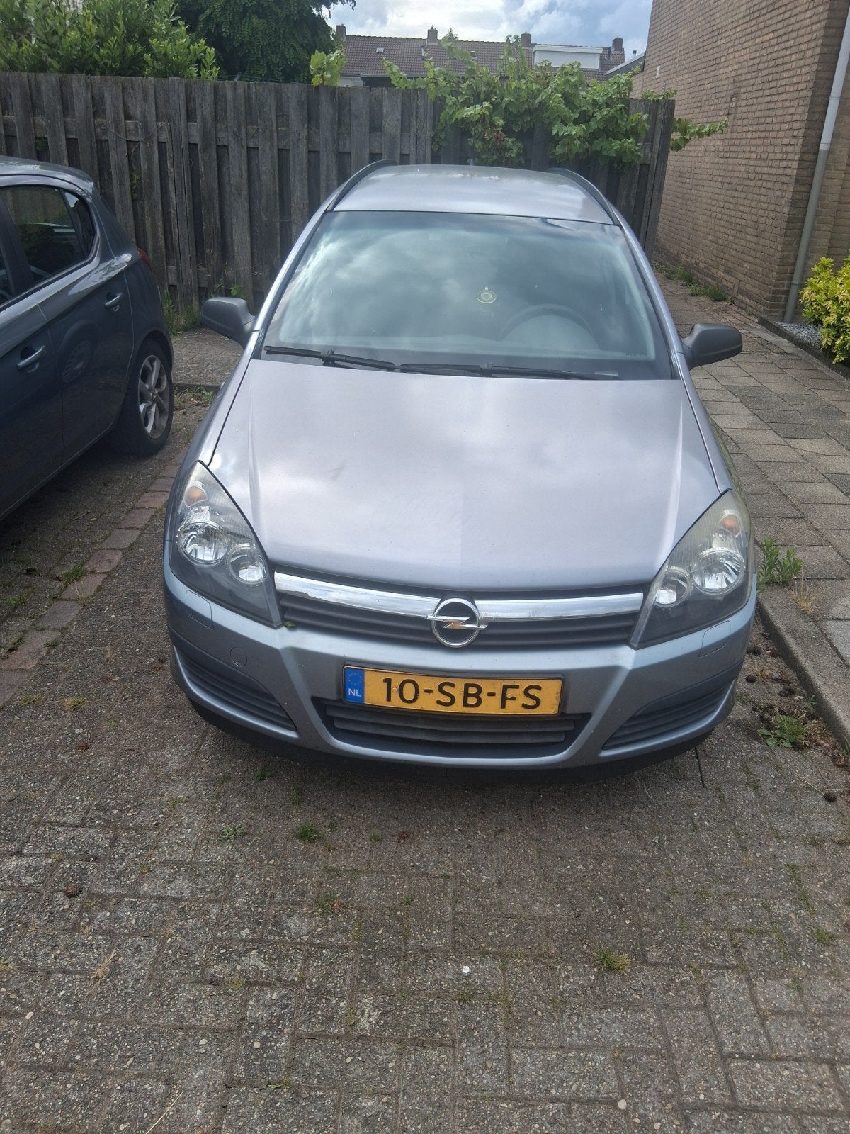 Opel Astra 1.8 16V St.wgn. 2005 Grijs, Auto's, 125 pk, 1225 kg, 4 cilinders, 1796 cc