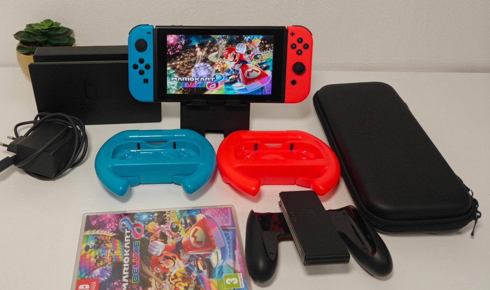 Nintendo Switch met Mario Kart 8 Deluxe, Spelcomputers en Games, Games | Nintendo Switch, Racen en Vliegen, Ophalen of Verzenden