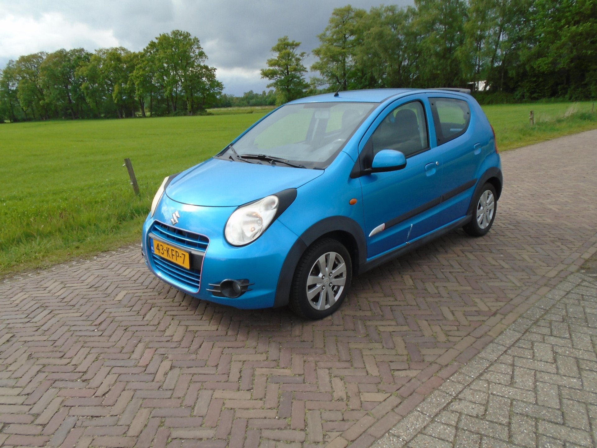 Suzuki Alto 1.0 Exclusive GT CRUISE ALL SEASON. (bj 2009), Voorwielaandrijving, Euro 5, Stof, Gebruikt