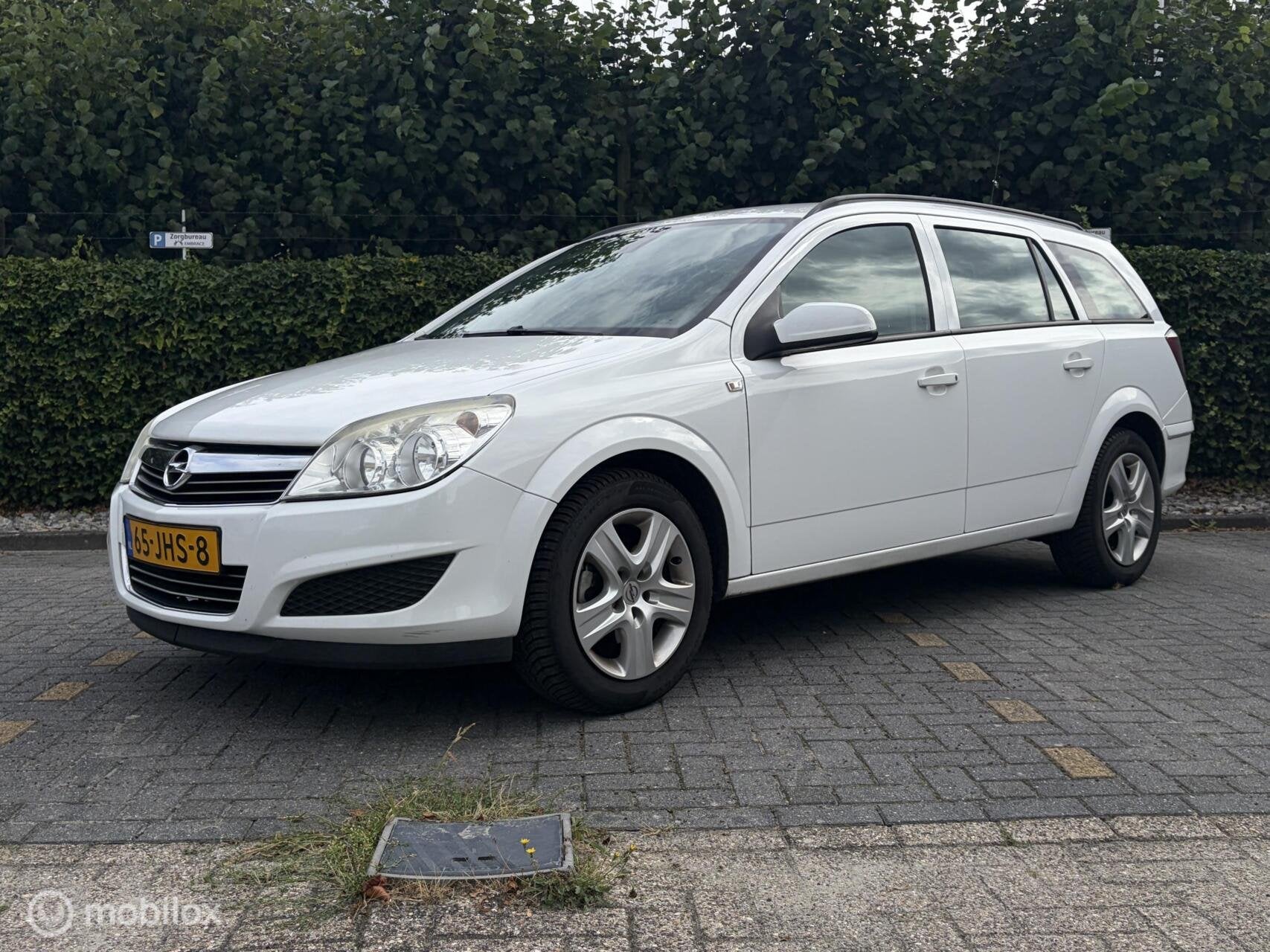 Opel Astra Wagon 1.6 Business INRUILKOOPJE / AIRCO / NETTE A, Auto's, Voorwielaandrijving, Gebruikt, Zwart, Wit