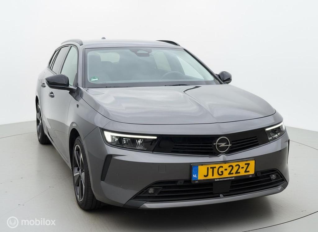 Opel Astra Sports Tourer 1.6 Turbo Plug In Hybrid Edition, Auto's, Stof, Gebruikt, Euro 6, 4 cilinders