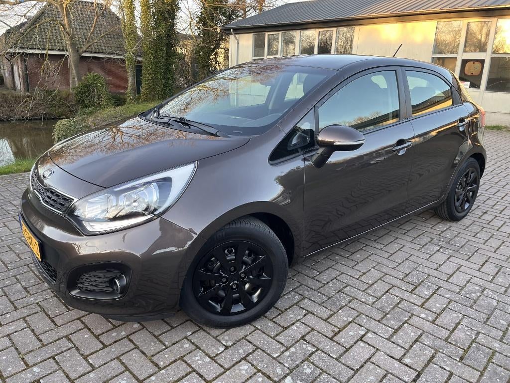 Kia Rio 1.2 I 5DRS 2011 Bruin, Auto's, Kia, Bedrijf, Rio, ABS, Airconditioning, Bluetooth, Bochtverlichting, Boordcomputer, Centrale vergrendeling