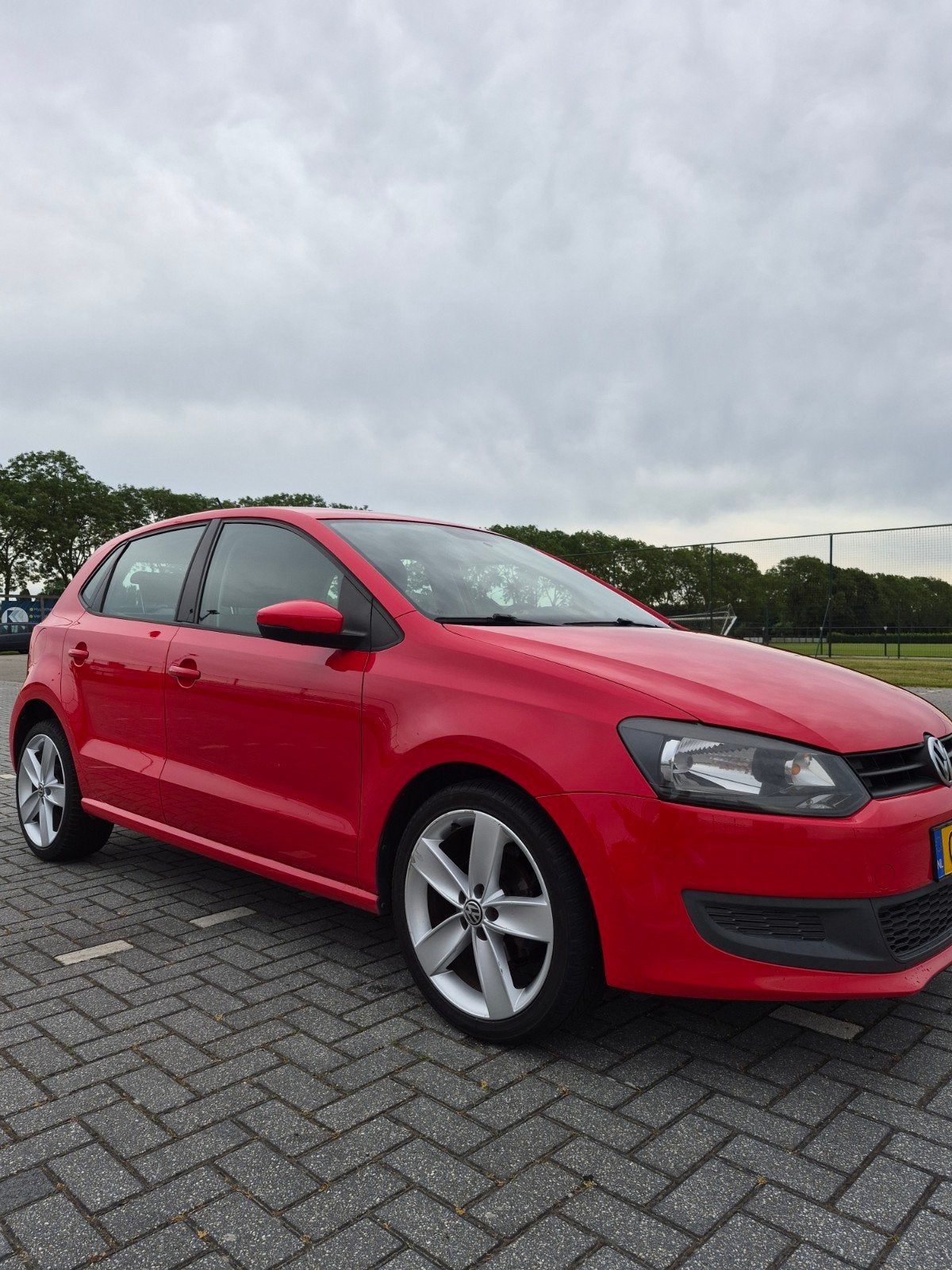 Volkswagen Polo 1.2 6V 44KW 5D My2009 2012 Rood, Auto's, Voorwielaandrijving, Zwart, 1198 cc, Handgeschakeld