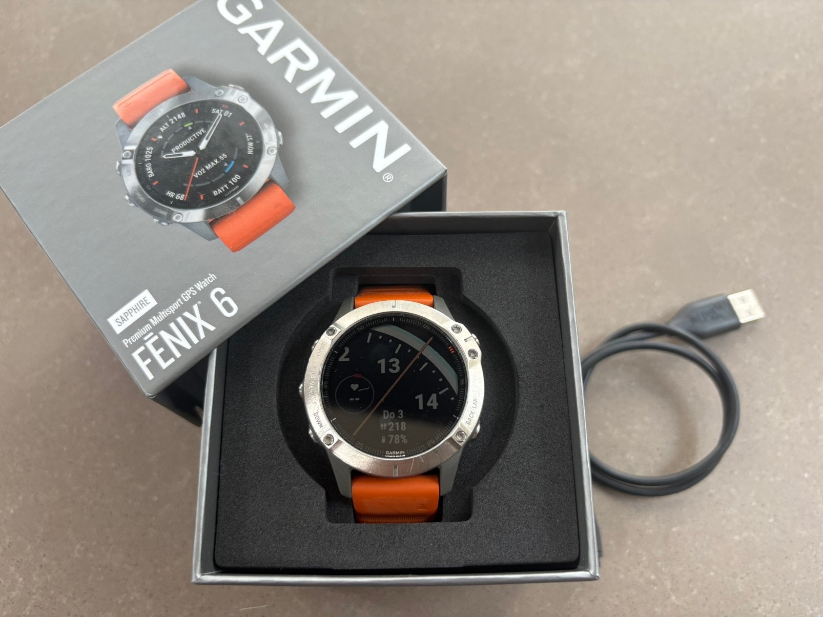 Garmin Fenix 6 Sapphire titanium met oranje band, Oranje, Ophalen of Verzenden, Zo goed als nieuw, Waterdicht