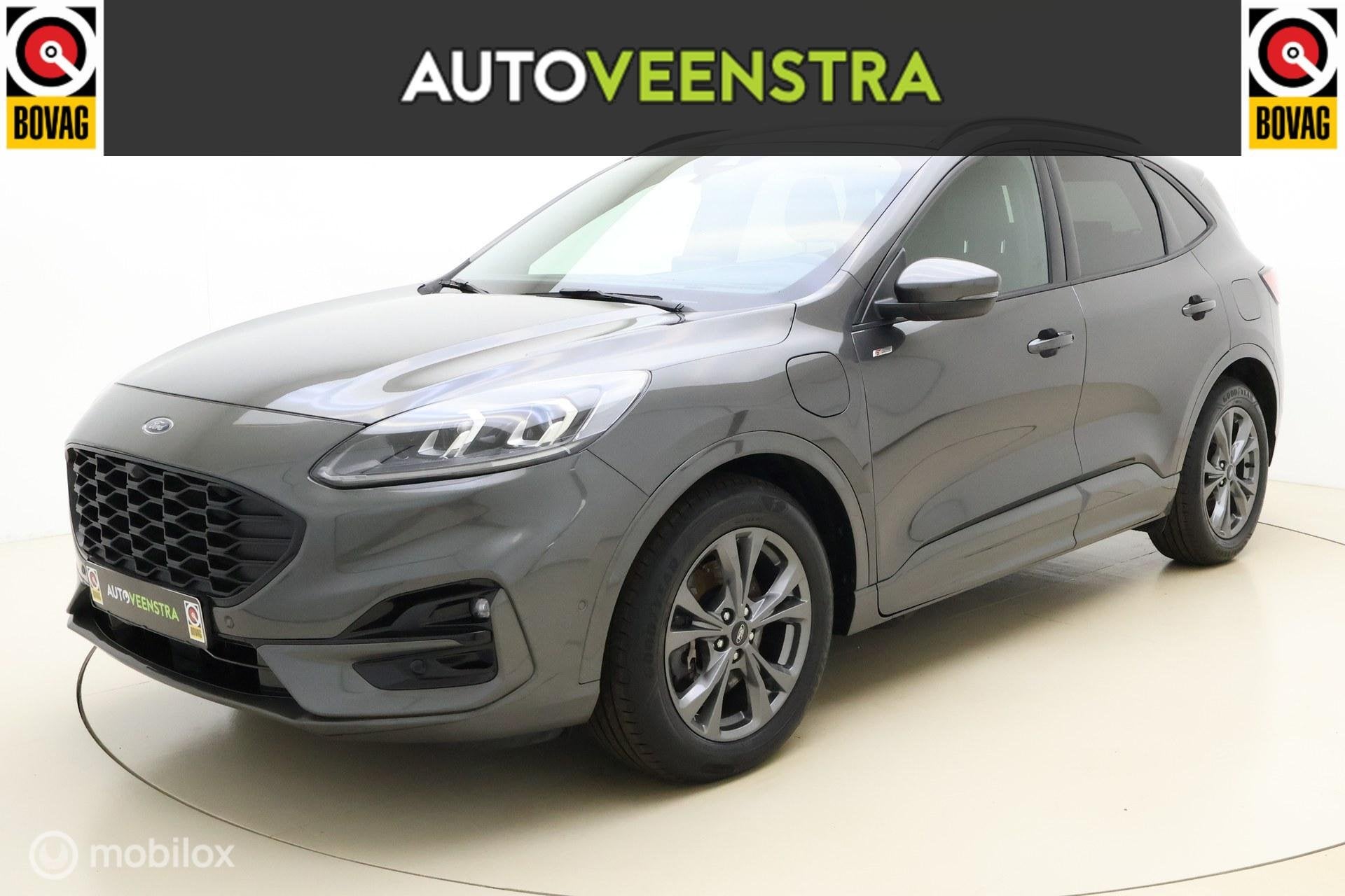 Ford Kuga 2.5 PHEV ST-Line|LUXE|B&O|TREKH|STOEL/STUUR.VERW, Gebruikt, Zwart, 4 cilinders, Met garantie (alle)