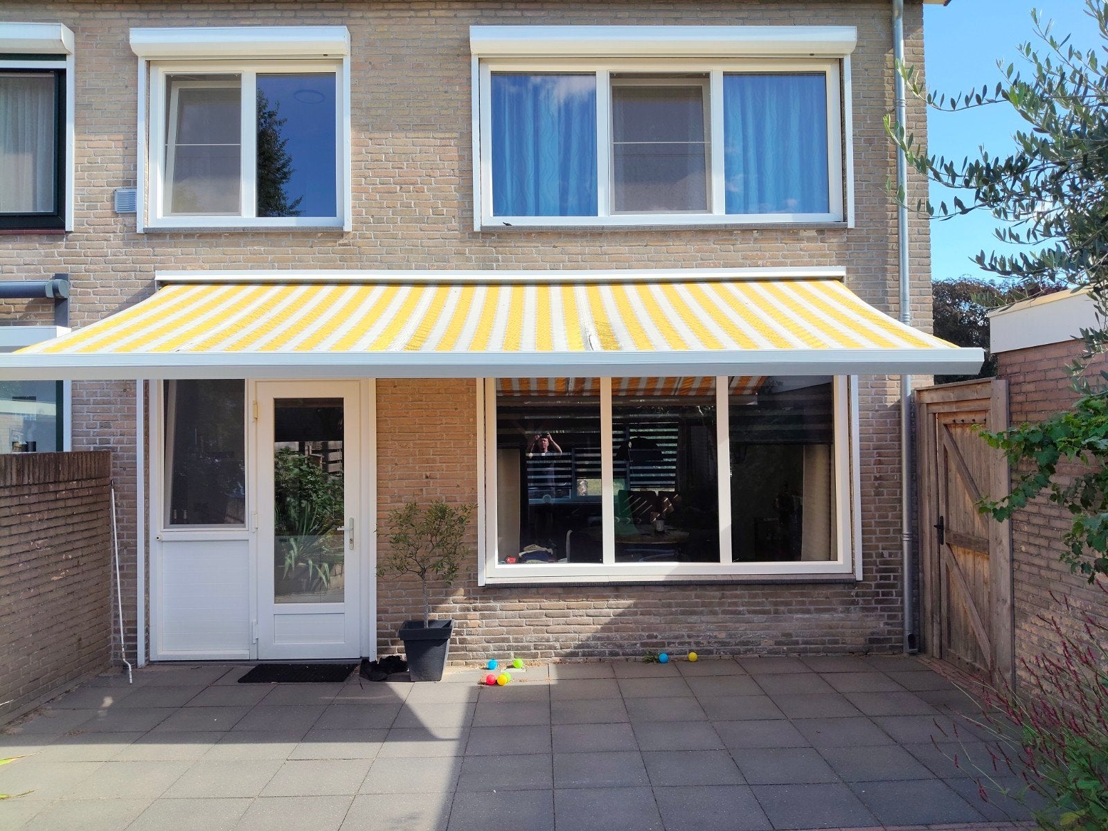 Knikarmscherm 550cm met loslatend doek., Ophalen, Gebruikt, 450 cm of meer, 150 tot 300 cm