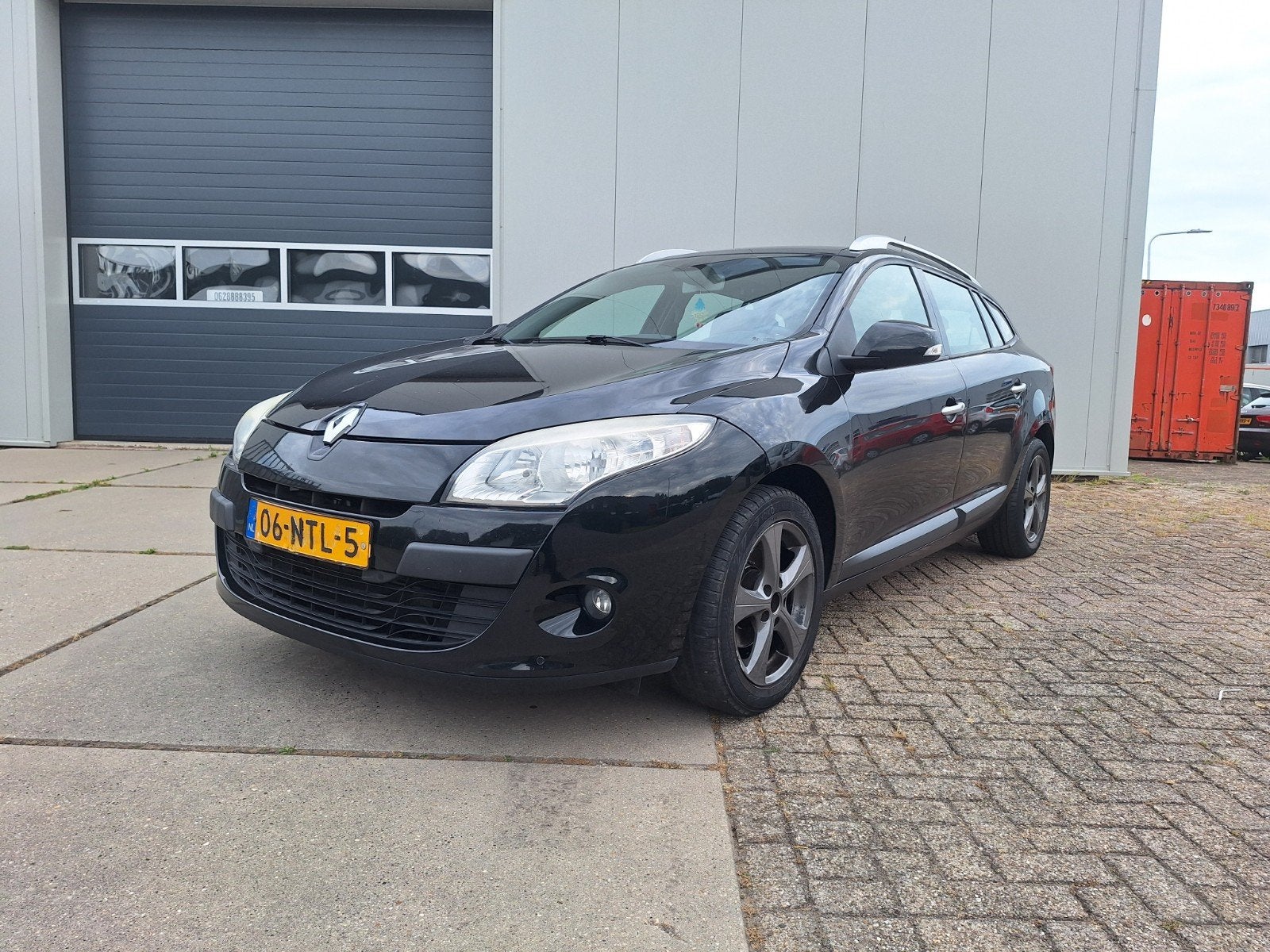 Renault Mégane 2.0 16V 103KW Estate CVT 2010 Zwart, Auto's, 4 cilinders, Zwart, Parkeersensor, 1260 kg