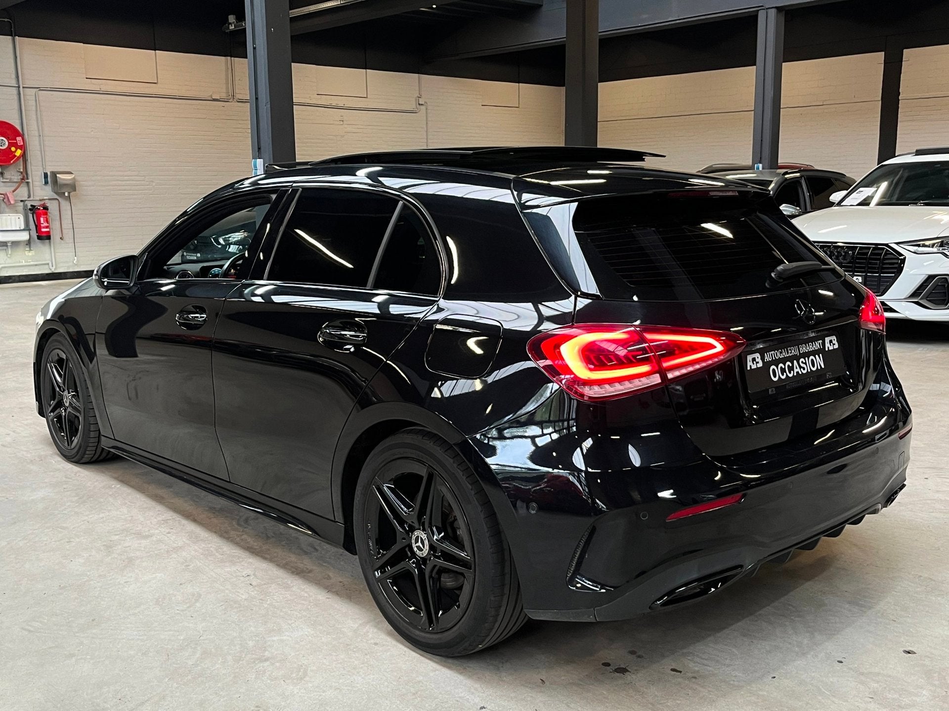 Mercedes-Benz A-klasse A 250 AMG Pano/Sfeer/CarPlay/Automaat, Auto's, 15 km/l, Gebruikt, Zwart, 4 cilinders