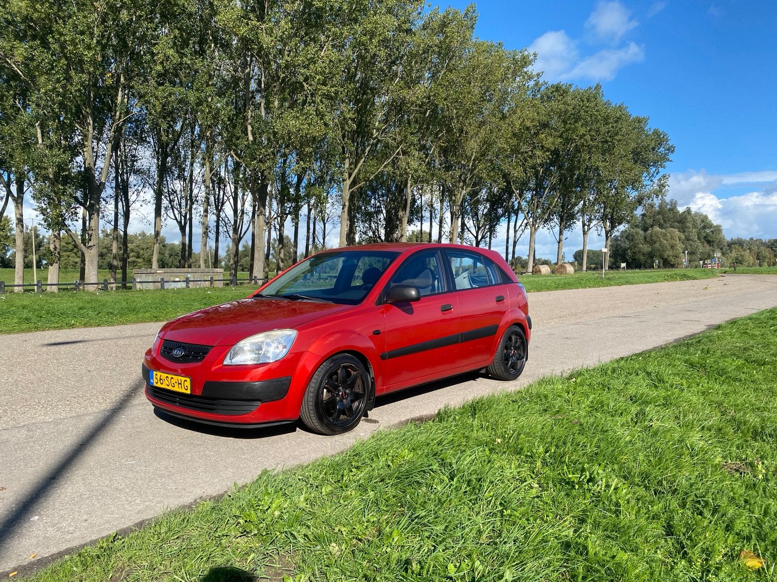 Kia Rio 1.4 HB 2006 Rood, Auto's, Voorwielaandrijving, Stof, 4 cilinders, 1054 kg
