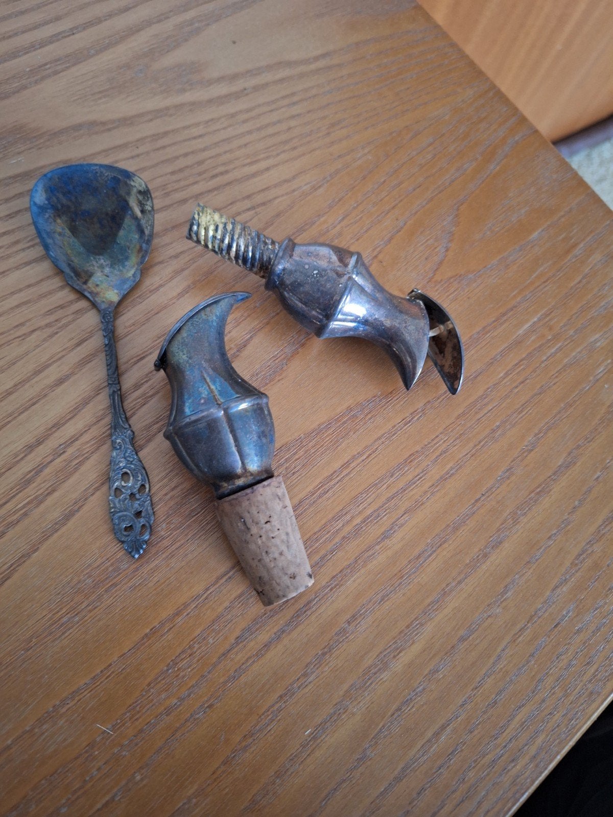 Antieke zilverkleurige lepel en flesopener/schenker, Ophalen