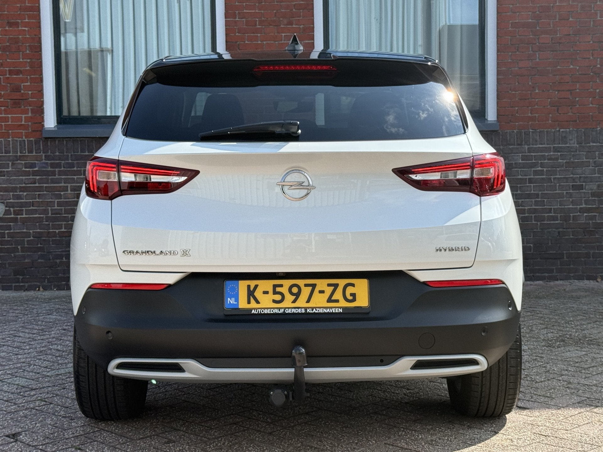 Opel Grandland X 1.6 Turbo Hybrid Business Elegance 181pk |, Auto's, Dealer onderhouden, 4 cilinders, Leder en Stof, Wit
