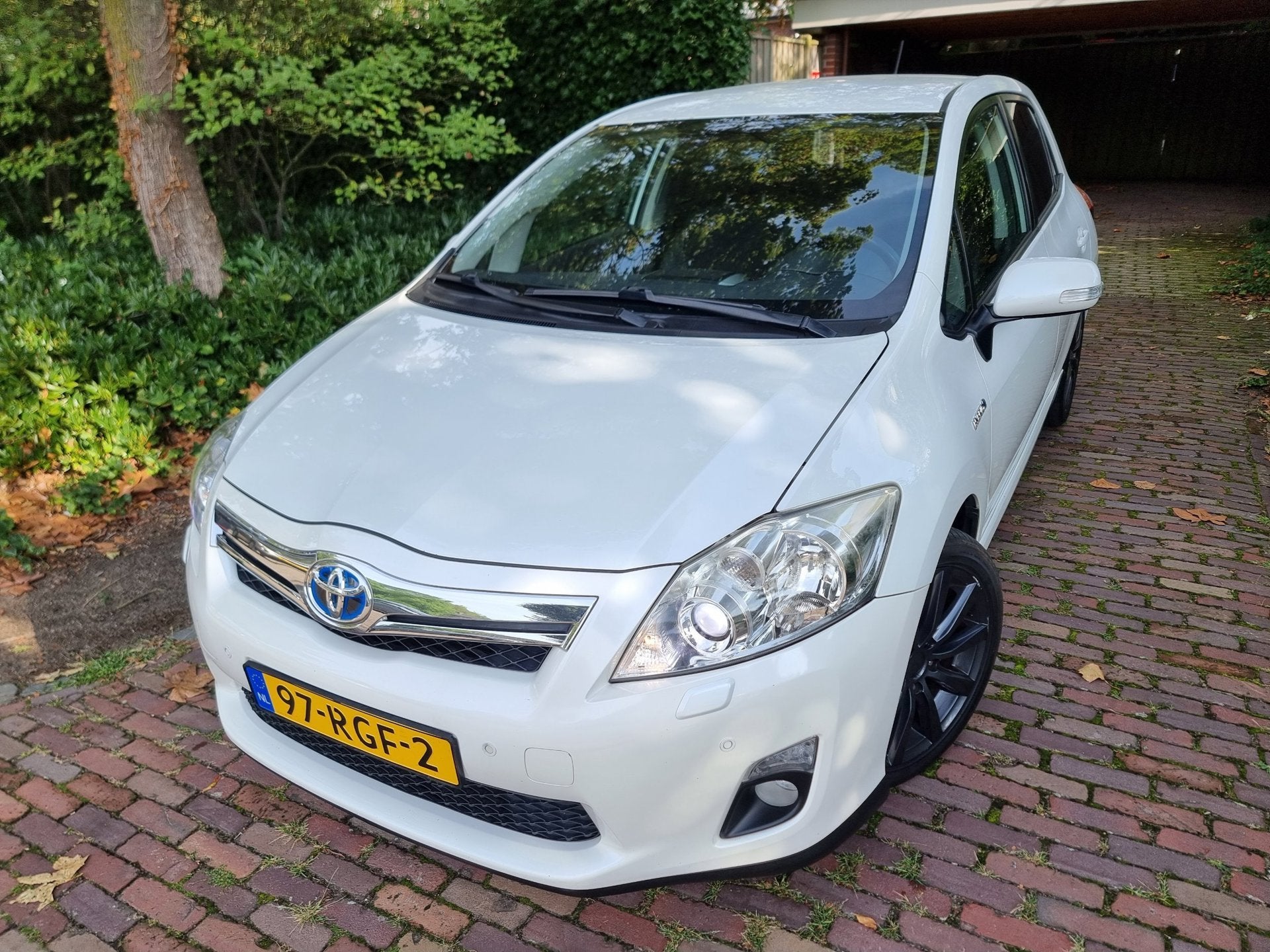 Toyota Auris 1.8 Full Hybrid Executive Xenon/Half Leder/Navi, Auto's, Toyota, Euro 5, Gebruikt, Zwart, 4 cilinders