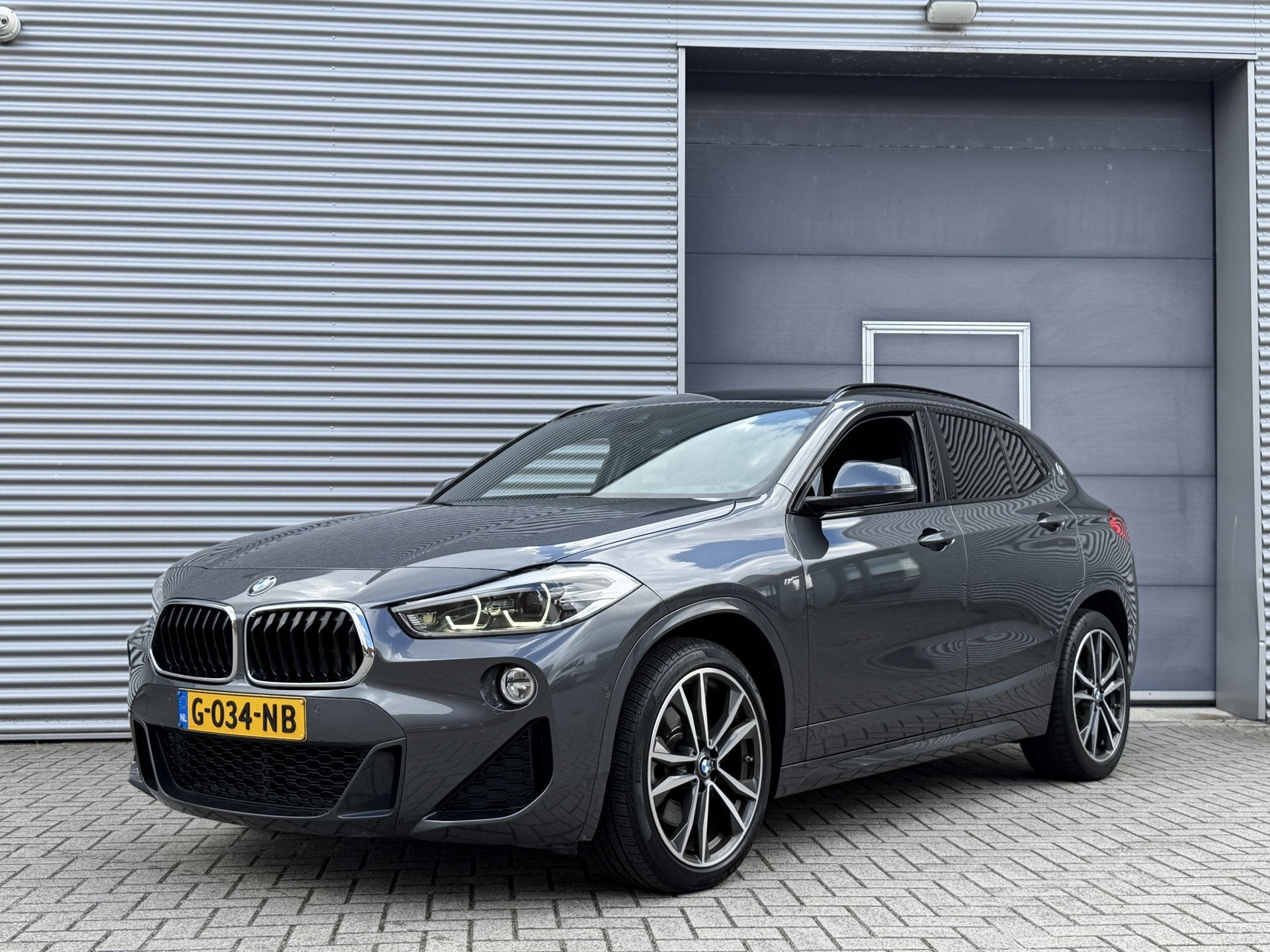 BMW X2 sDrive20i High Executive I Aut. I M-Sport I Navi, Auto's, Automatische klimaatregeling, 1435 kg, Leder en Stof, SUV of Terreinwagen