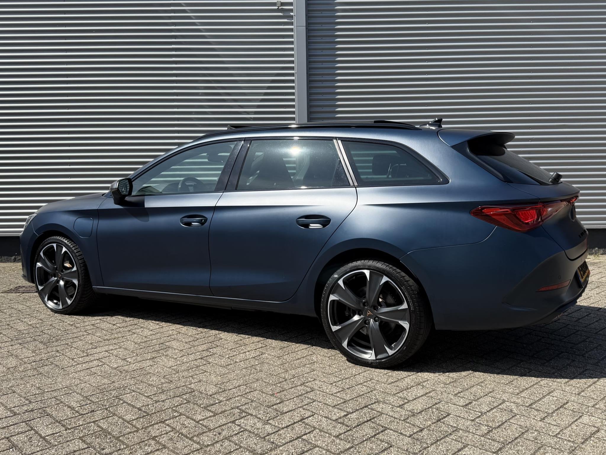 CUPRA Leon Sportstourer 1.4 e-Hybrid VZ Business | Schuif/Ka, Auto's, Stof, Gebruikt, 4 cilinders, Automatische klimaatregeling