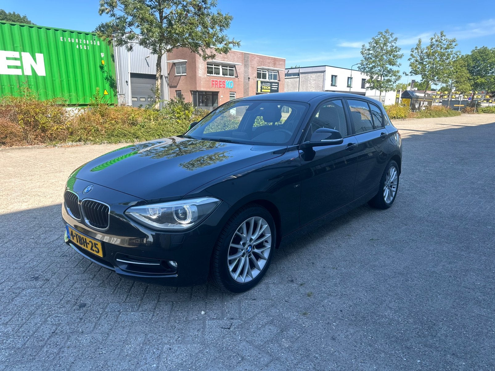 BMW 1-Serie 116i 136PK 5D Aut.2014 Zwart LEER AUTOMAAT XENON, 4 cilinders, Zwart, 650 kg, Automatische klimaatregeling