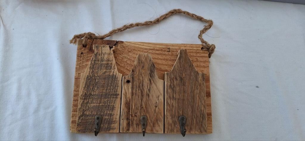 Houten kinder kapstok, Ophalen