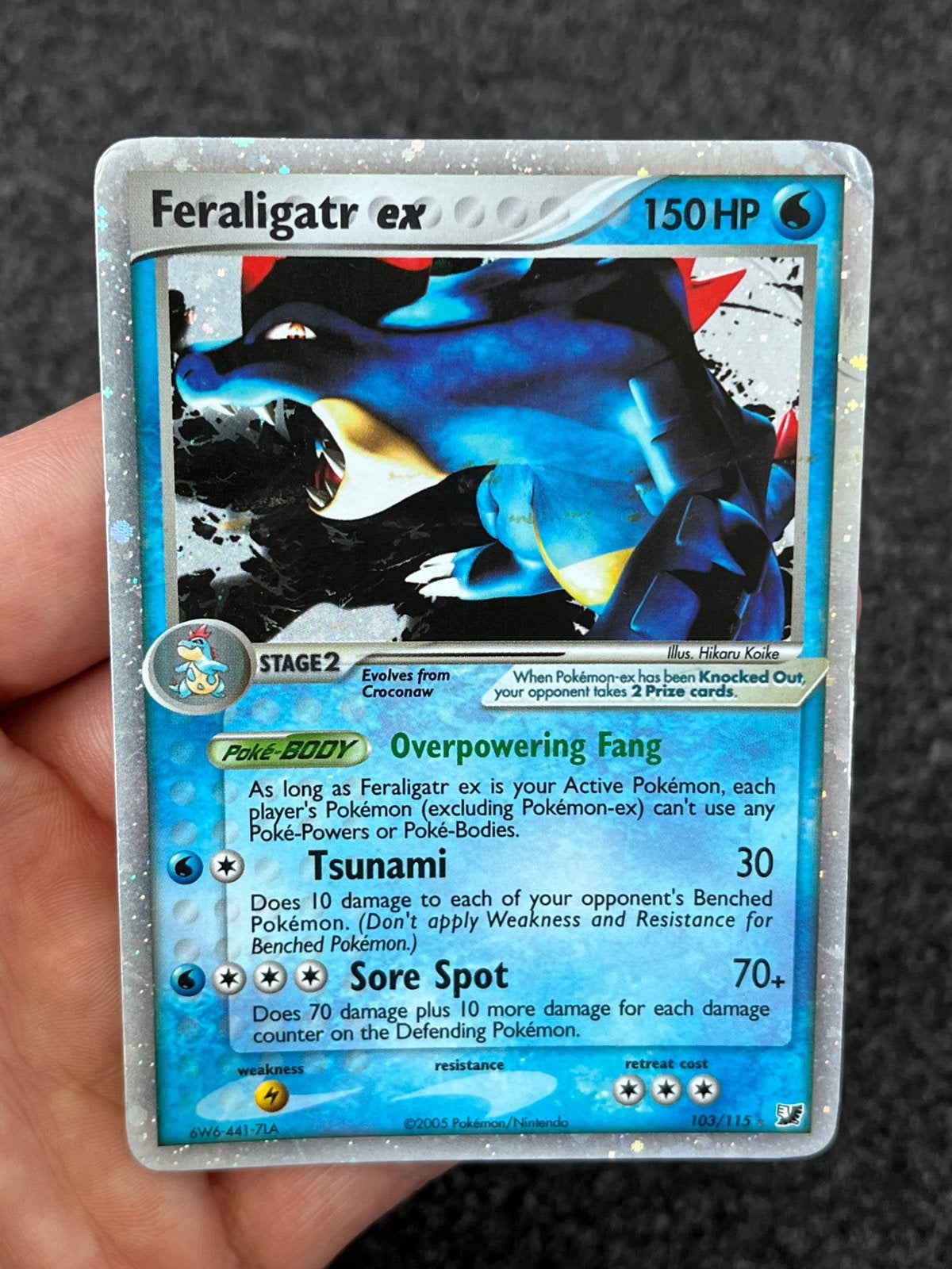 Pokémon Feraligatr ex holo #103 unseen forces - light played, Ophalen of Verzenden, Zo goed als nieuw, Losse kaart, Foil