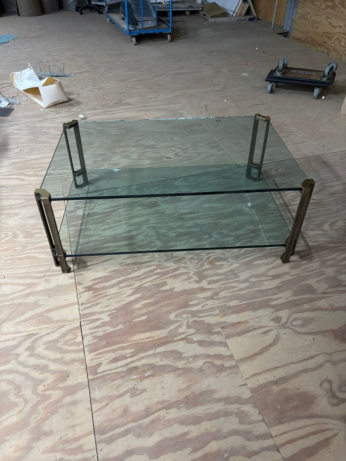 Glazen salontafel met messing details, Huis en Inrichting, Ophalen, 50 – 75, Gebruikt, 100 tot 150 cm