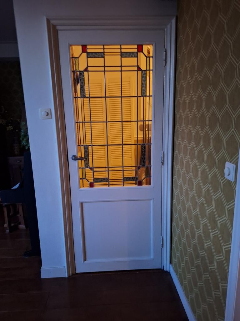 Te koop glas in lood deur, Ophalen