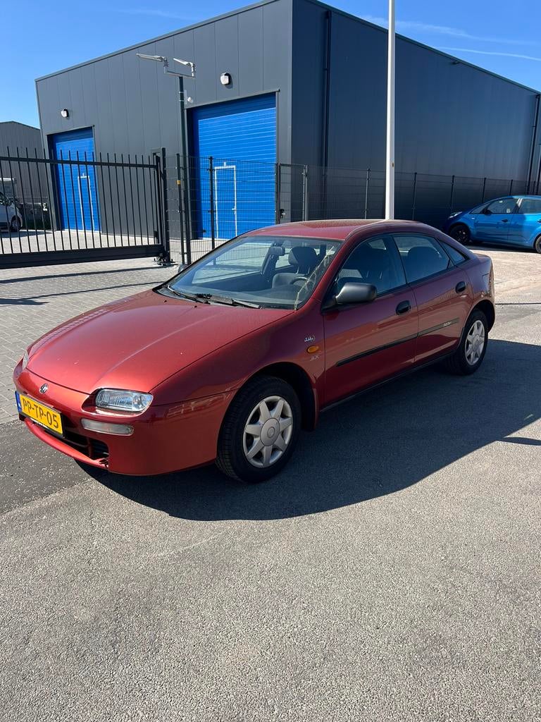 Mazda 323 1.5 I F GLX rijd schakelt super nette auto uniek !, Auto's, Voorwielaandrijving, 1489 cc, 4 cilinders, 400 kg