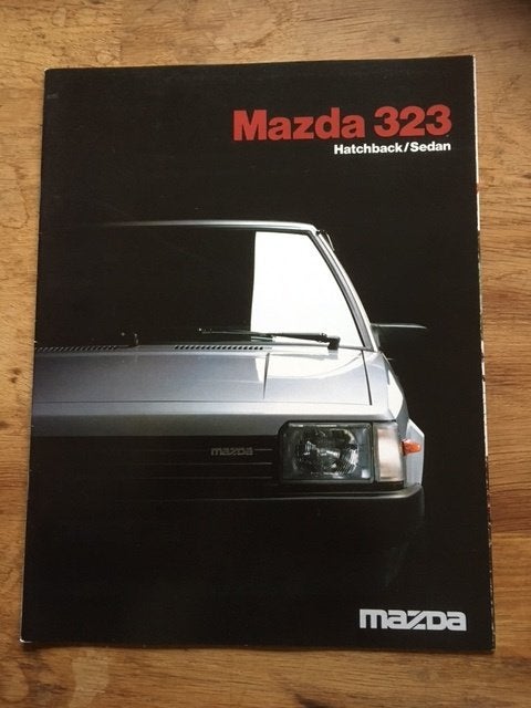 Partij Mazda Autofolders/Brochures (25 stuks) 1983-1985, Ophalen of Verzenden, Gelezen, Mazda