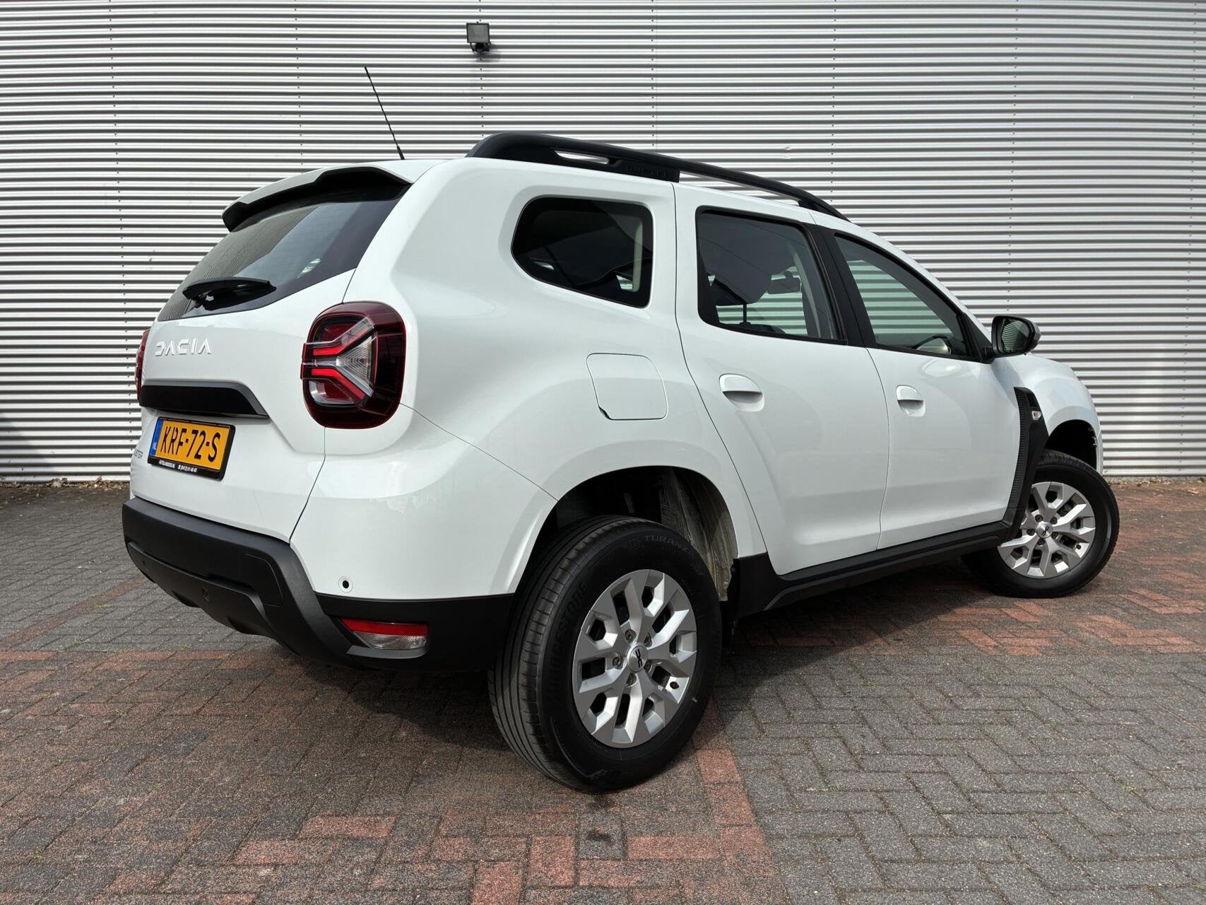 Dacia Duster 1.0 TCe Hoge Instap Airco cruise Carplay Led 23, Auto's, Voorwielaandrijving, Stof, Gebruikt, Wit