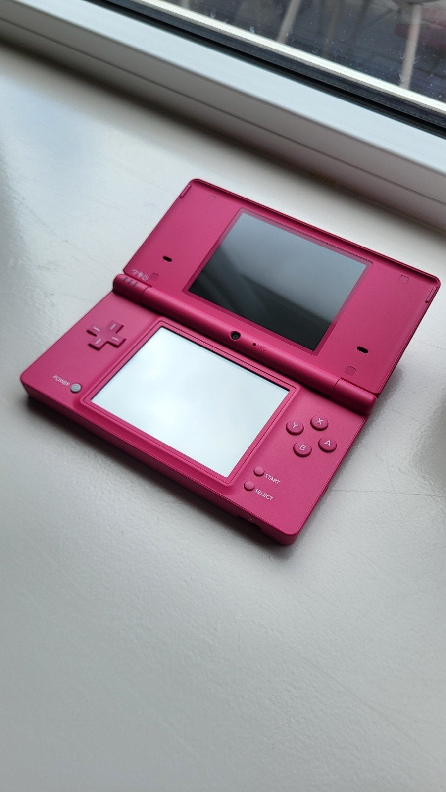 Nintendo DSi Roze - Zo goed als nieuw, in doos + supermario, Spelcomputers en Games, Spelcomputers | Nintendo DS, Ophalen of Verzenden