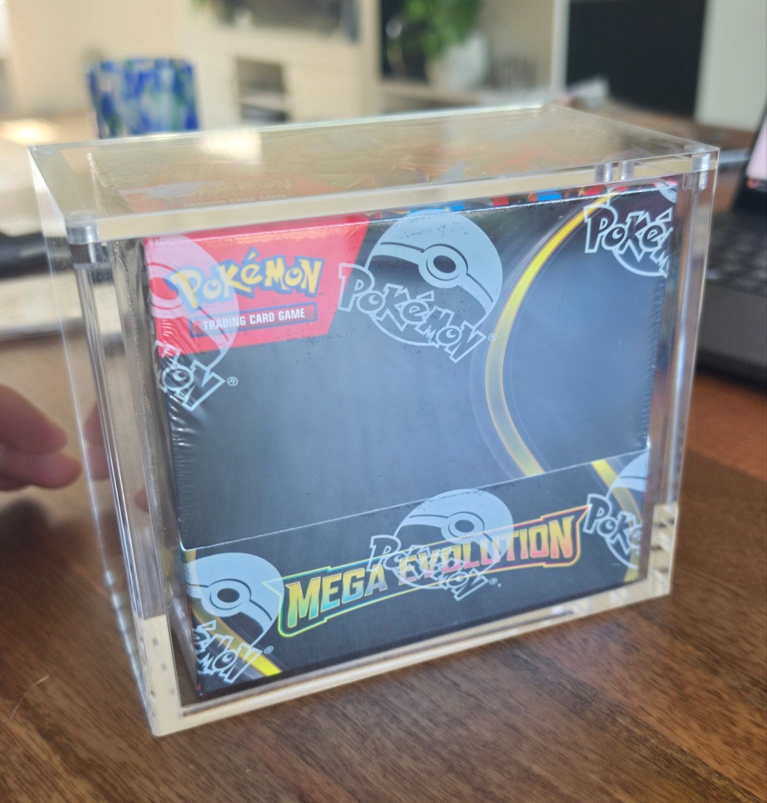 Pokémon Mega Evolution Booster Box in Acryl Display, Ophalen of Verzenden, Nieuw, Boosterbox