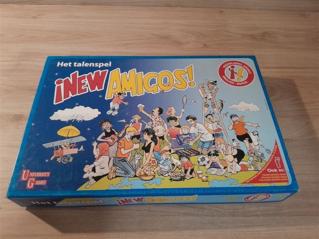 New Amigos - Het talenspel - Engels - Nederlands - s5864, Hobby en Vrije tijd, Gezelschapsspellen | Bordspellen, Verzenden, Zo goed als nieuw