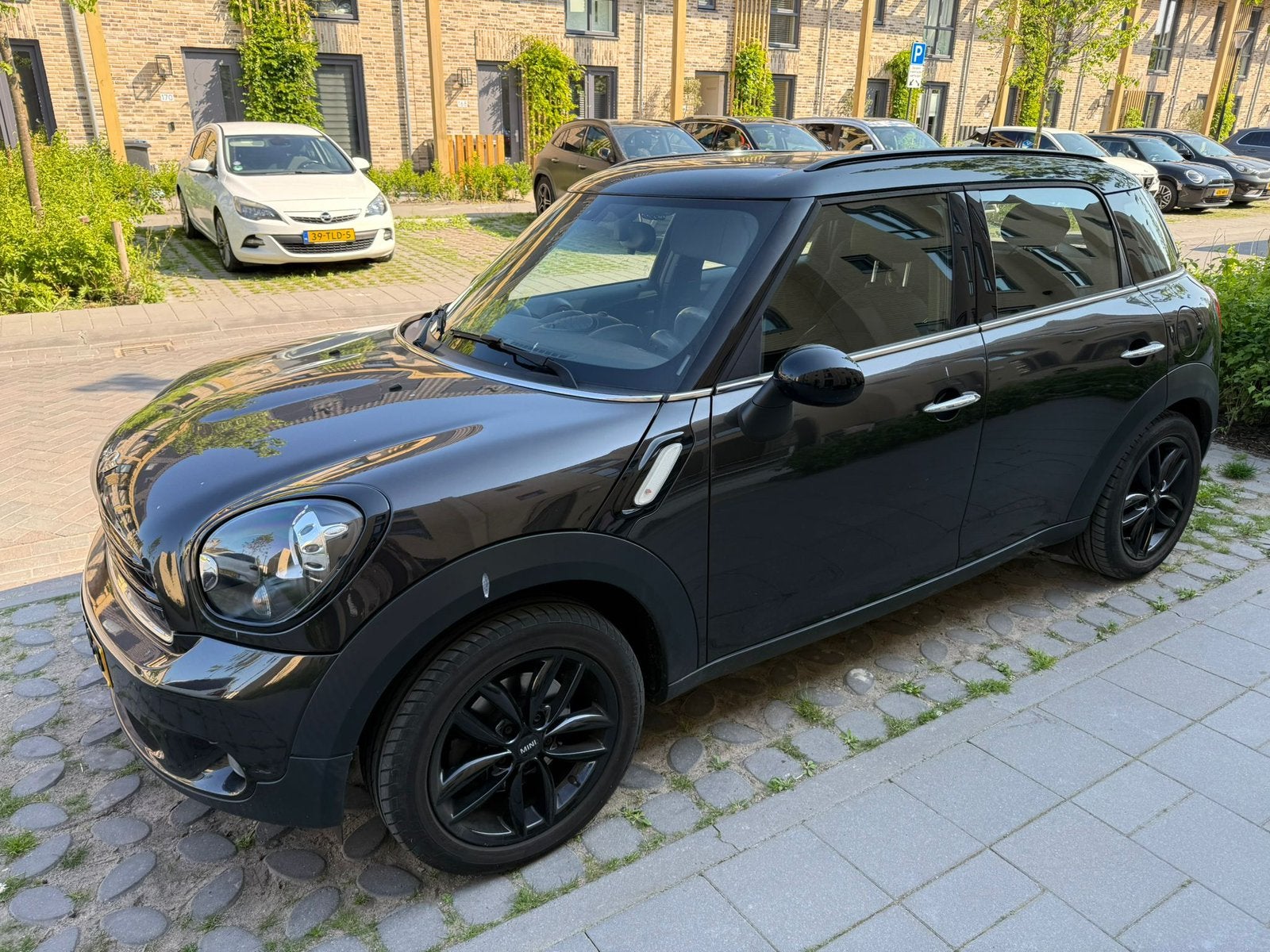 Mini Countryman 1.6 Cooper 2015 - incl 2jr GRATIS onderhoud, Auto's, Mini, Voorwielaandrijving, Zwart, Bruin, Leder en Stof